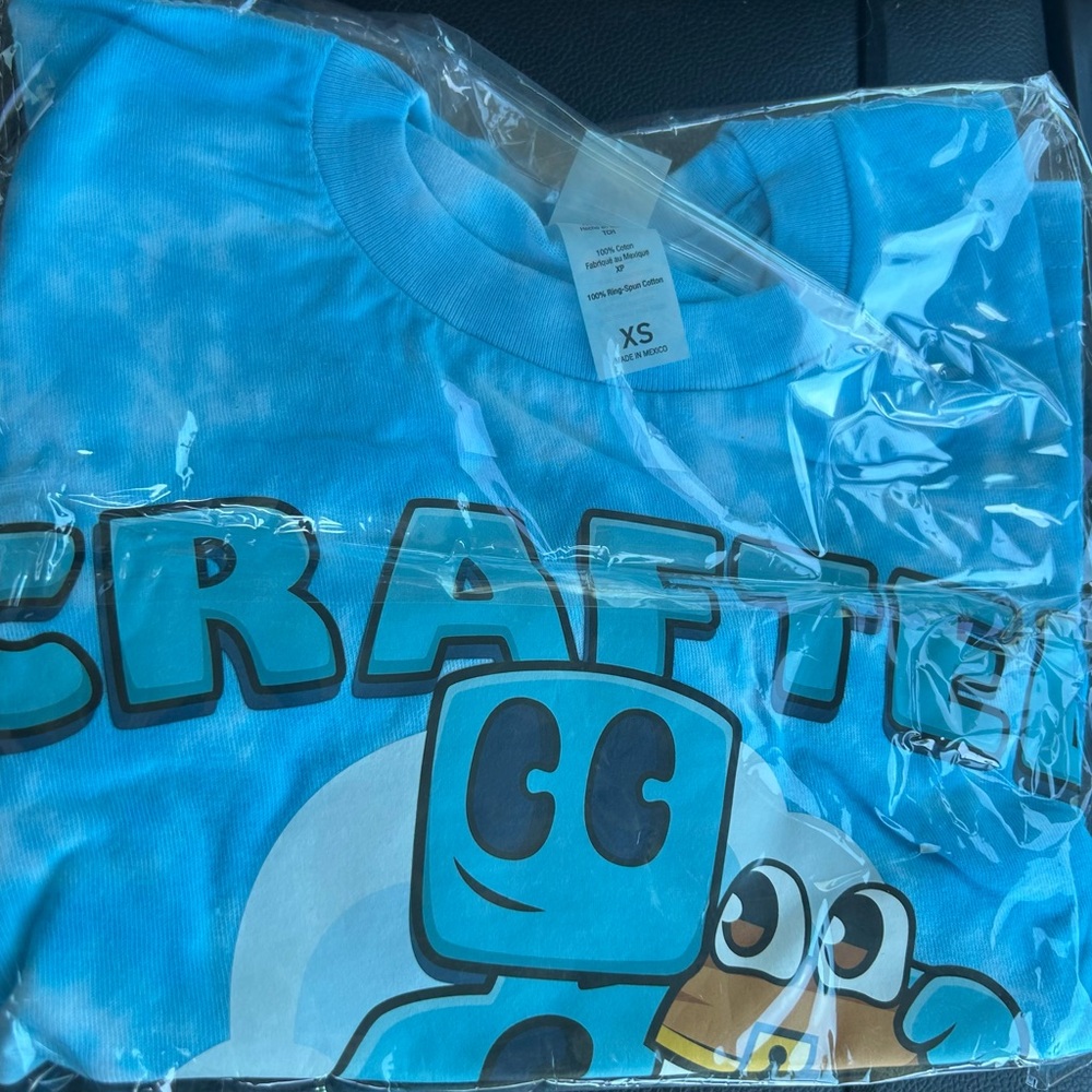 Blue Graphic T-Shirt with Cartoon Design